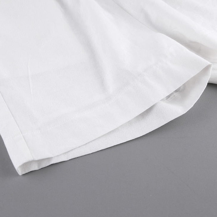 סט חולצה מכופרת ומכנסיים קצרים